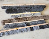 Assorted concrete broom heads, used