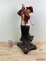 Woman golf statue