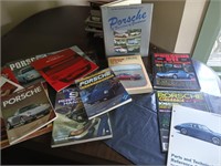 Porsche promos, manuals, 1 hardback book look at
