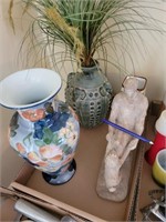 Collectible vases and a statue/figurine