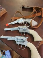 Three children's vintage revolvers (2-ponyboys)