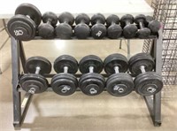 Large Rack Of Curling Barbell Weights