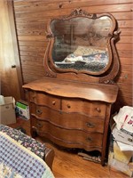 Oak serpentine dresser with mirror