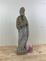 Concrete St. Francis statue, cracked