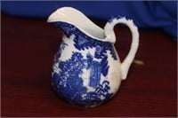 A Small Japanese Blue and White Creamer