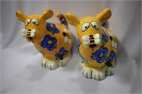 A Pair of Ceramic Cow Bank
