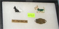 Pair of dog pins, 1941 dog license and bar pin