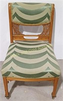 Intricate Carved Back Cushioned Chair
