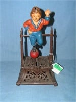 Boy on Trapeze cast iron mechanical bank circa 195