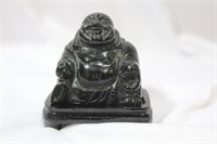 A Nephrite Jade Buddha on Stand