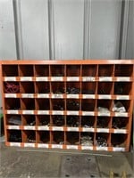 Parts master, pigeon hole bins, 34 x 24 x 12“,