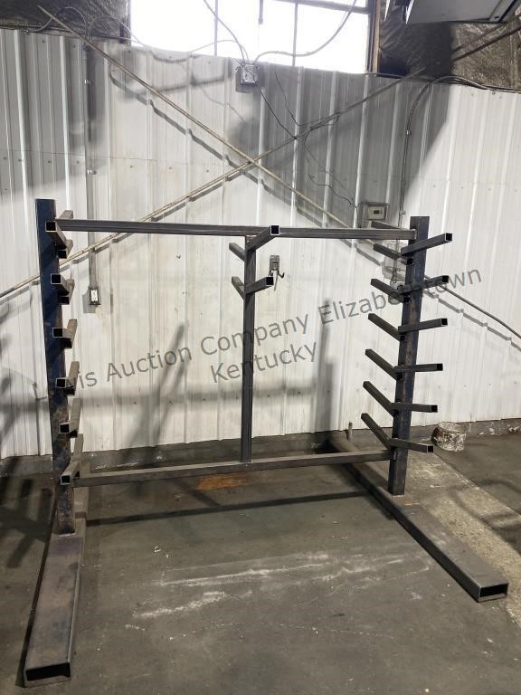 Large metal frame stock rack 65 inches tall 75