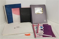 Notebooks and file folders.