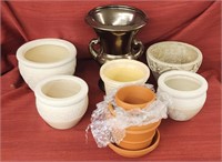 Assorted flower pots, heights ranging from 3 in -