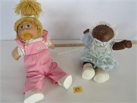 2 Cabbage Patch dolls, played with
