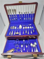 50 pieces of sterling flatware plus 13 additional