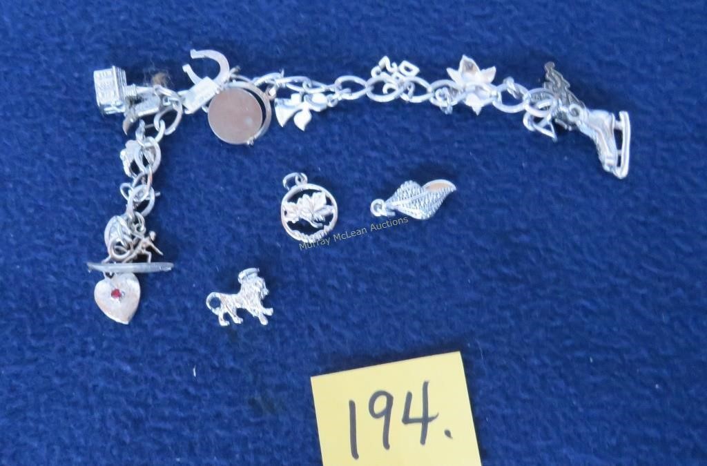 charm bracelet w some sterling charms +
