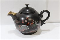 A Japanese or Chinese Lacquer Teapot