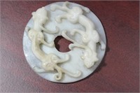 A Chinese White Jade Chilung Disc
