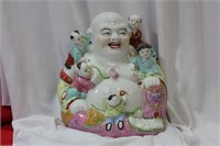 A Vintage Porcelain Buddha with Children