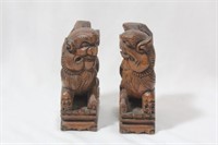 A Pair of Carved Wooden Foo Lions