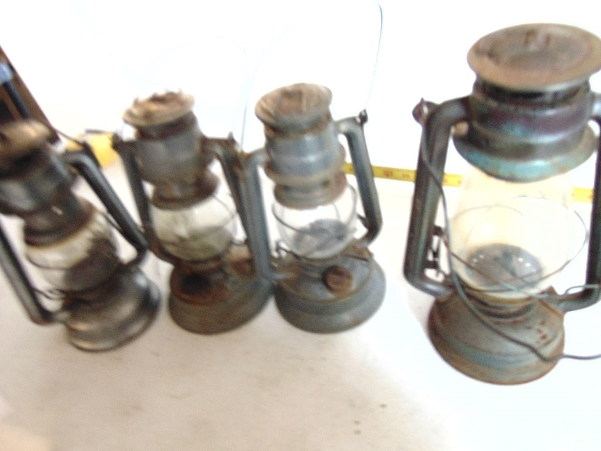 Four Old Oil Lamps