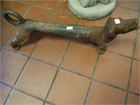 Iron dachshund figure, 21" long, was a boot