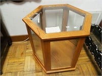 Hexagonal oak display case with glass on top and
