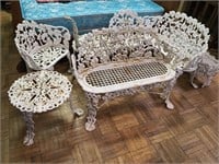 Eight pieces of cast iron garden furniture with