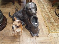 Two dog figurines: one is 16" high with shoe in