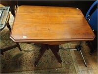 Walnut Eastlake Victorian lamp table, 30" long