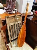 Two wooden 38" paddles, rug beater and washboard