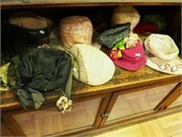 13 vintage hats, many with broad brims,