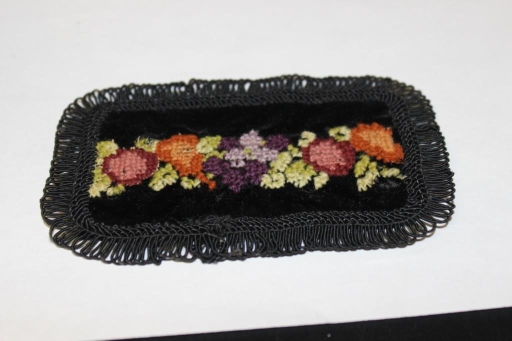 A Vintage Miniature Wool Rug