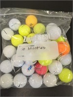 30 used golf balls