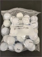 30 used golf balls