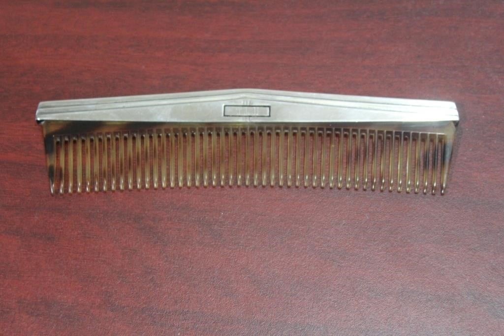 International Sterling and Tiger Skin Lucite Comb
