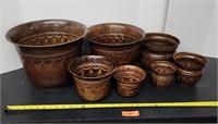 Set of 7 tin flower pots.