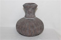 A Ceramic, most likely Clay Bottle/Vase