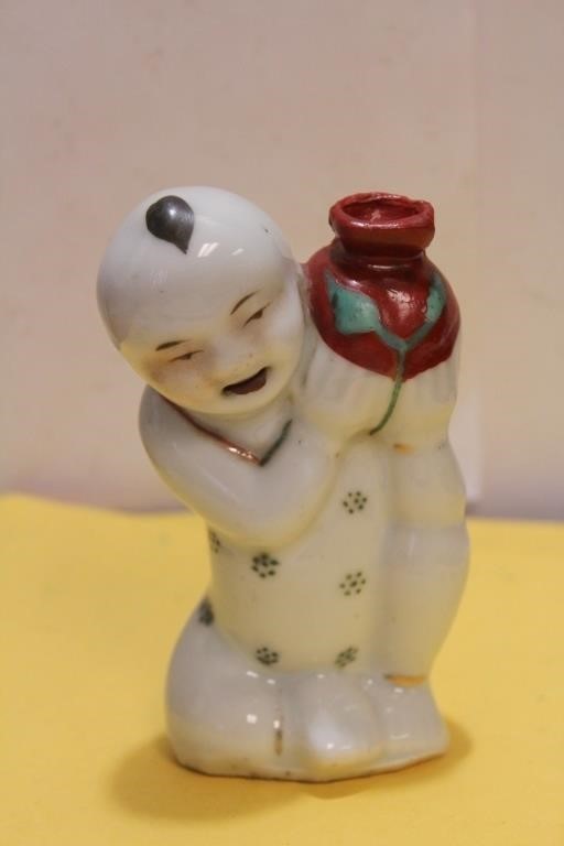 An Antique Chinese Ceramic Boy with Jug Figure