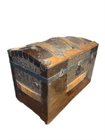 Antique camelback trunk chest on casters