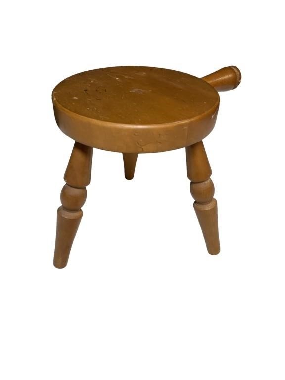 Handmade tri-legged wooden milking stool