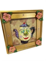 Unusual whimsical framed ceramic Mrs. teapot face