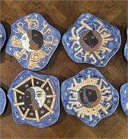 Eight Large Mara Pottery Face Plates