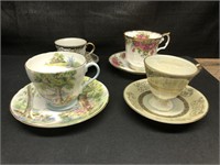 4 assorted cups & saucers