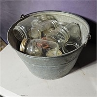 Galvanized bucket of jars