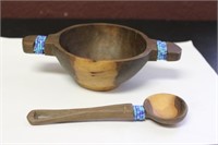 A Decorative Wooden Bowl and Spoon