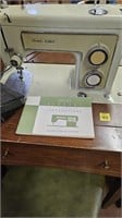 Vintage Sears Kenmore sewing machine and table