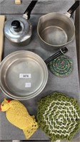 Pots and crocheted trivets