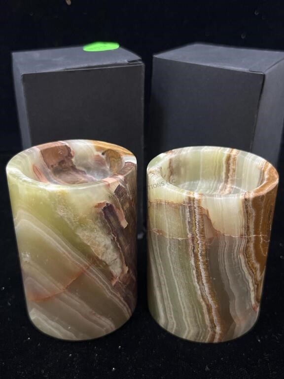 Pair carved Onyx stone candle holders.